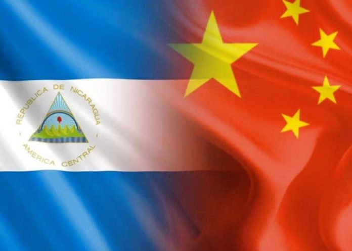 Foto: Banderas de Nicaragua y China Foto: Banderas de Nicaragua y China