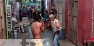 Foto: Dos hombres protagonizan una pelea estilo boxeo en el Mercado Roberto Huembes / TN8