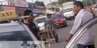 Foto: Pleito de taxistas en el Mercado Oriental, popular mercado en Managua, Nicaragua / TN8