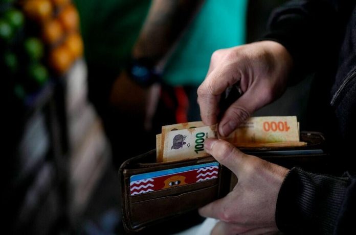 Foto: Inflación y salarios en caída/Cortesía