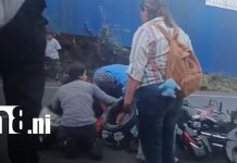 Motociclista y joven embarazada resultan lesionadas tras accidente en Crtra. a Masaya Foto: Accidente de tránsito en Carretera Masaya a Managua / TN8